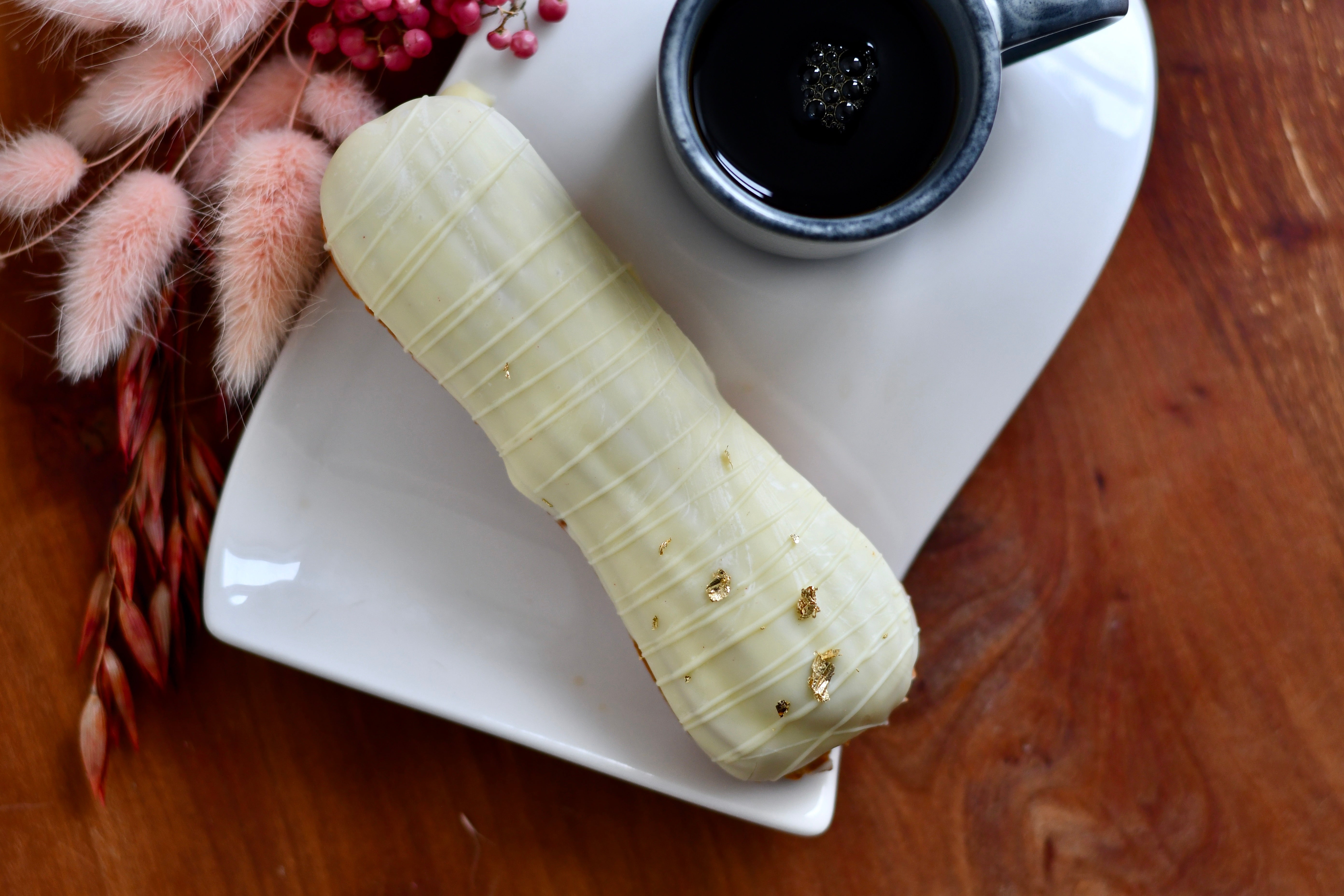 Cookies n' Cream Eclair with White Chocolate Glaze